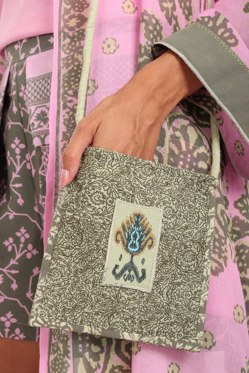 Embroidered small cross body bag in printed cotton